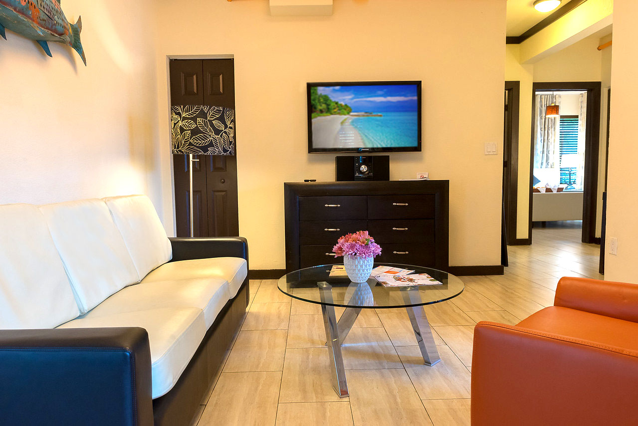 Tradewinds Apartment Hotel. One Bedroom Apartment Suites. Living Room